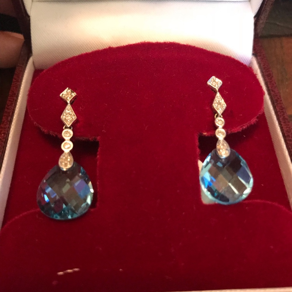 Brand new white gold diamond earrings